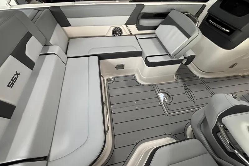 Slide: The Image of Interior of Chaparral SSX 4 boat, gray upholstery, modern design, year 2026. - 22