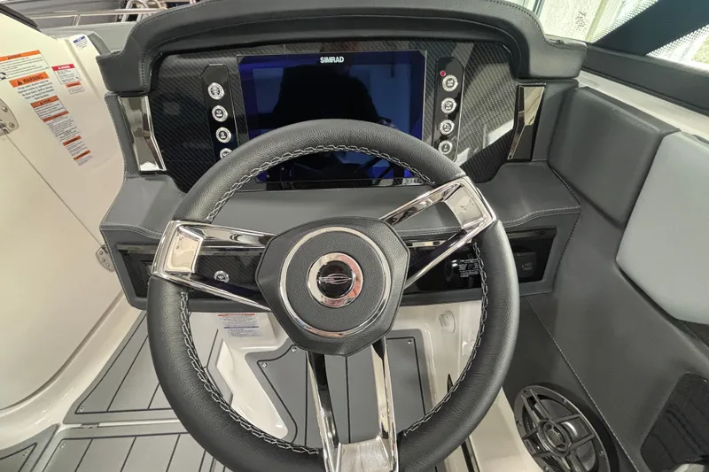 Slide: The Image of Interior of 2026 Chaparral SSX 4 with modern steering wheel. - 23