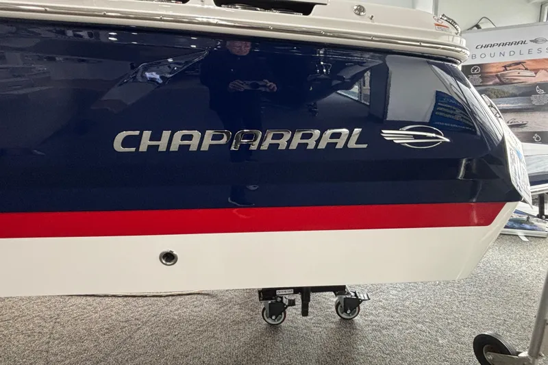 Slide: The Image of 2026 Chaparral SSX 4 boat hull with logo and red stripe. - 4