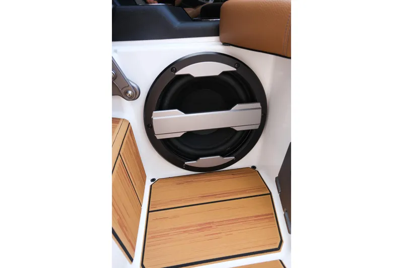 Slide: The Image of 2026 Supra SL interior speaker with wood paneling and modern design. - 24