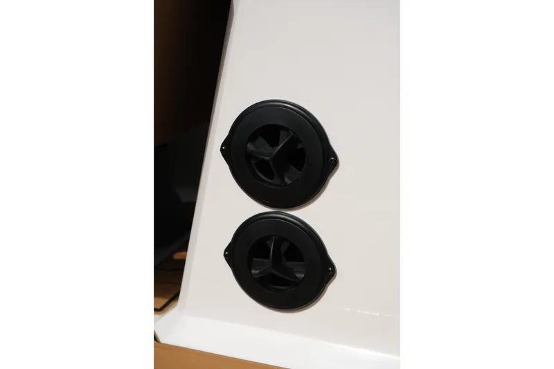 Slide: The Image of 2026 Supra SL boat with dual black air vents on white surface. - 29