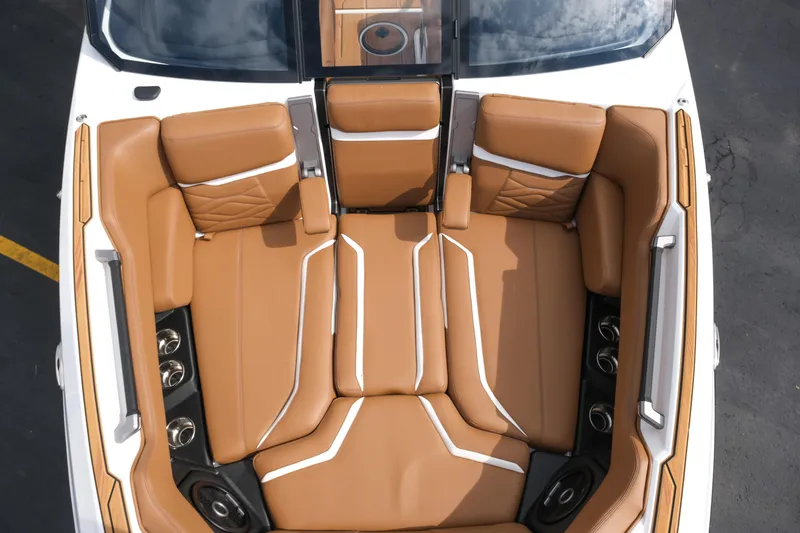 Slide: The Image of Luxurious 2026 Supra SL boat interior with tan leather seating and modern design elements. - 36