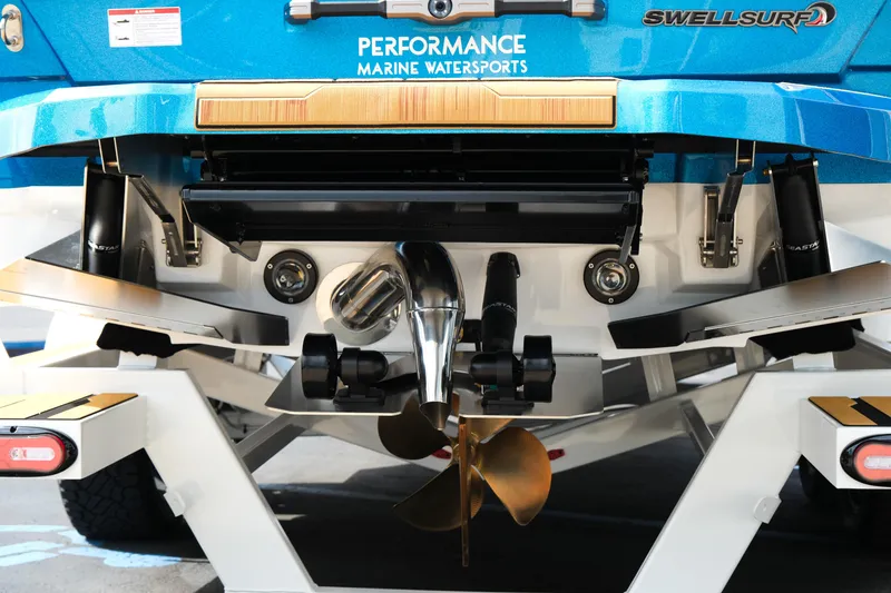 Slide: The Image of 2026 Supra SL boat rear view with propeller and performance features. - 7