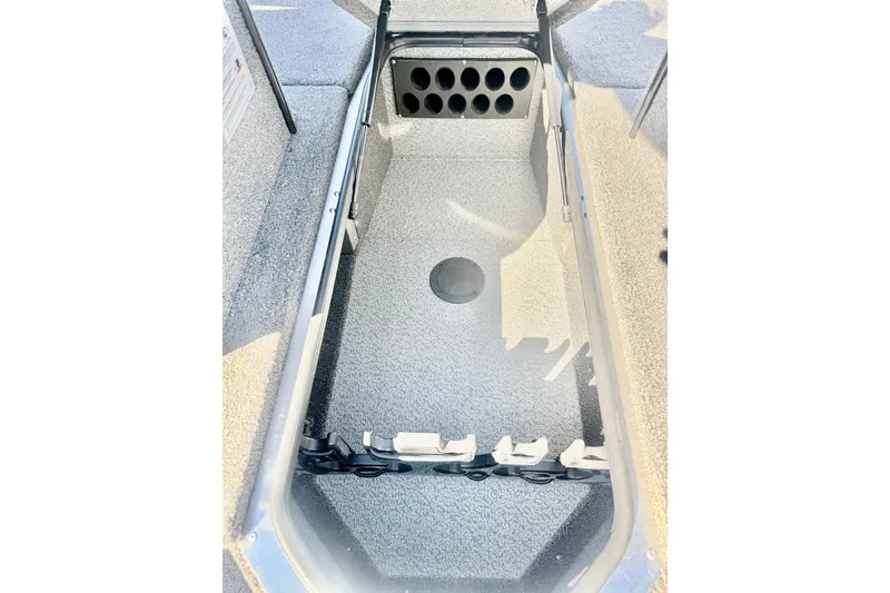 Slide: The Image of 2026 Lund 2075 Fisherman boat interior with rod storage compartment. - 18