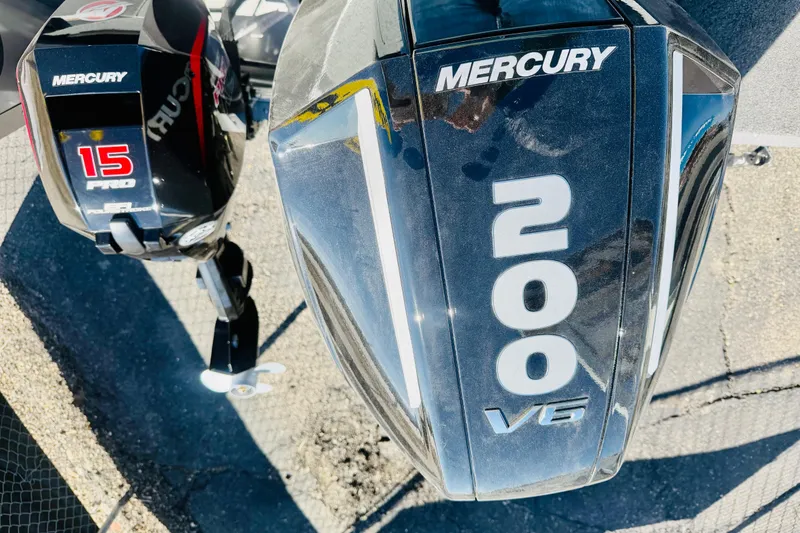 Slide: The Image of 2026 Lund 2075 Fisherman with Mercury 200 V6 and 15 Pro outboard engines. - 8