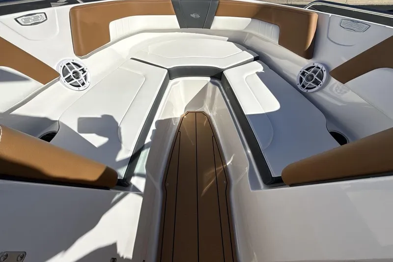 Slide: The Image of Interior of 2025 Chaparral 23 SSi boat with white and brown seating. - 11