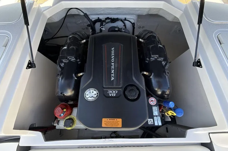 Slide: The Image of 2025 Chaparral 23 SSi boat engine compartment with Volvo Penta 300 V8 engine. - 20