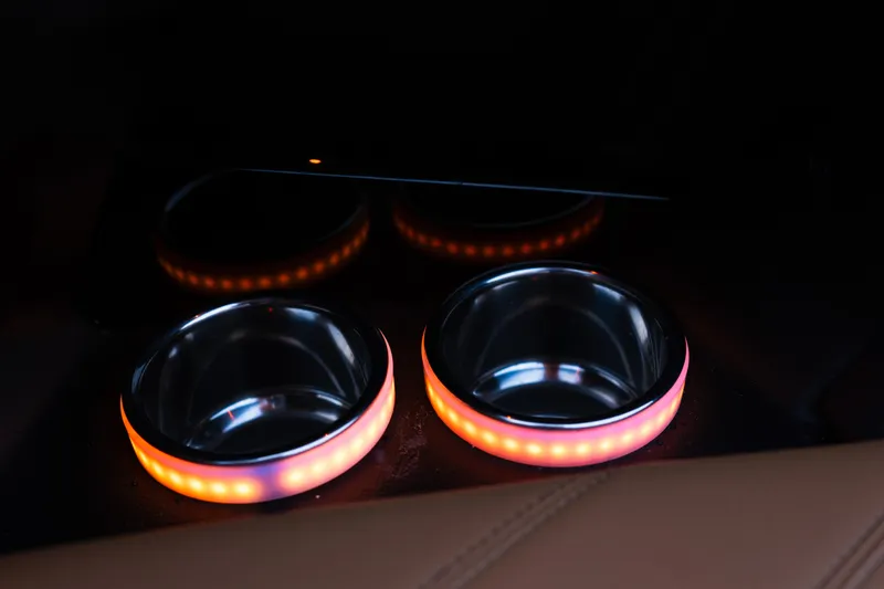 Slide: The Image of 2024 Supra SE illuminated cup holders with ambient lighting. - 19