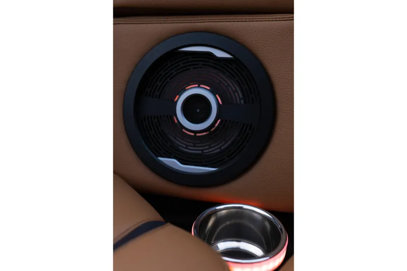 Slide: The Image of 2024 Supra SE interior speaker and illuminated cup holder detail. - 21
