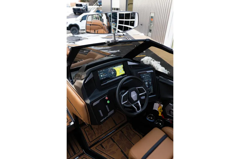 Slide: The Image of 2024 Supra SE boat dashboard with advanced navigation and control systems. - 33