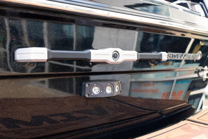 Slide: The Image of 2024 Supra SE boat with Swell Surf system and camera detail. - 53