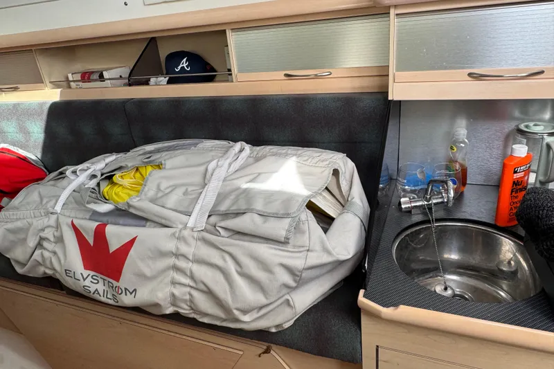 Slide: The Image of Compact bathroom in 2016 Dragonfly 32 sailboat with sink, toilet, and storage. - 11