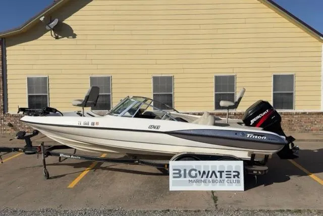 The Image of 2002 Triton SF-21 boat on trailer, parked outside Bigwater Marine & Boat Club. - 0
