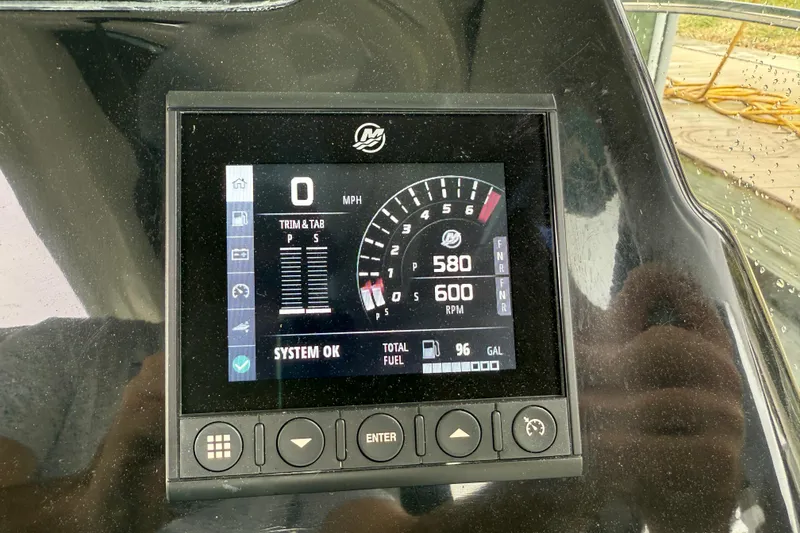 Slide: The Image of Dashboard display of a 2020 Beneteau Antares 9 showing speed, RPM, and fuel level. - 17