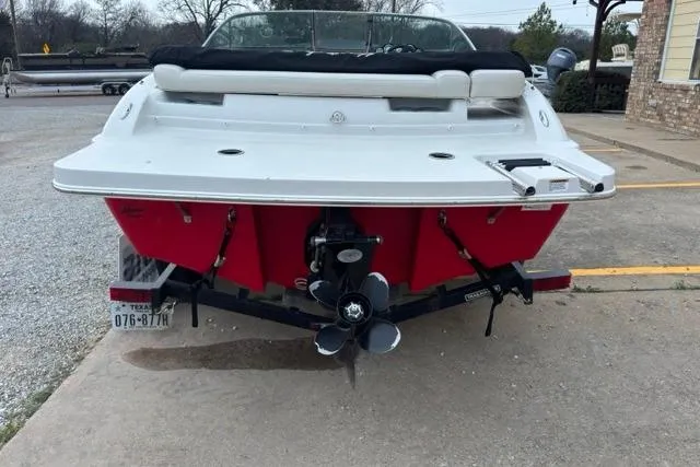 Slide: The Image of Rear view of a 2011 Starcraft 2018 IO Limited boat on a trailer. - 3