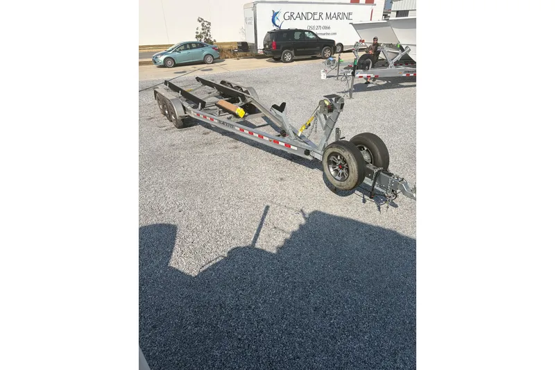 Slide: The Image of Trailer for 2022 Blackfin 272 CC boat at Grander Marine dealership. - 19