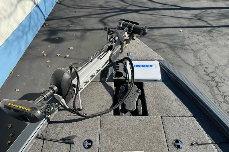 Slide: The Image of 2018 Lund 1875 Pro-V Bass boat deck with Minn Kota trolling motor and Lowrance electronics. - 11