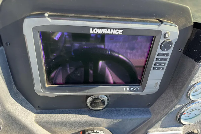 Slide: The Image of Lowrance HDS9 fishfinder on 2018 Lund 1875 Pro-V Bass boat dashboard. - 14