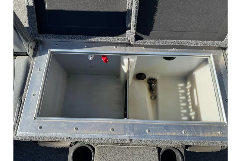Slide: The Image of Open storage compartment in 2018 Lund 1875 Pro-V Bass boat. - 15