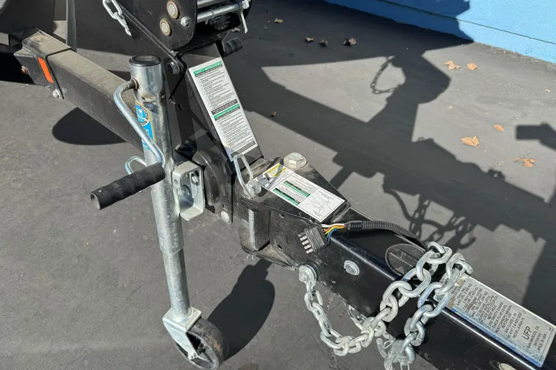 Slide: The Image of Trailer hitch and jack of a 2018 Lund 1875 Pro-V Bass boat. - 7