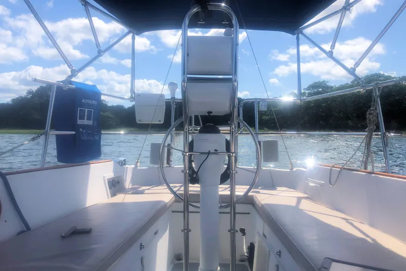 Slide: The Image of Cockpit view of a 1981 Catalina 30 sailboat on a sunny day. - 11