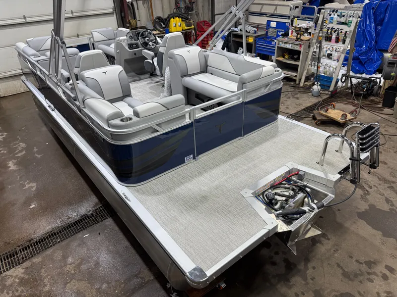 Slide: The Image of 2026 Tahoe Sport 2180 Quad Lounge pontoon boat in workshop. - 40