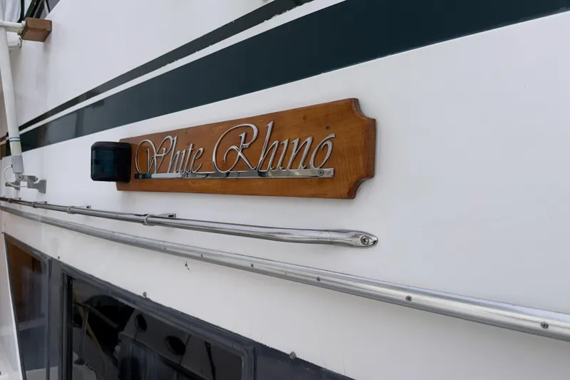 Slide: The Image of 1984 Gulfstar 49 Motor Yacht with "White Rhino" nameplate on the side. - 16