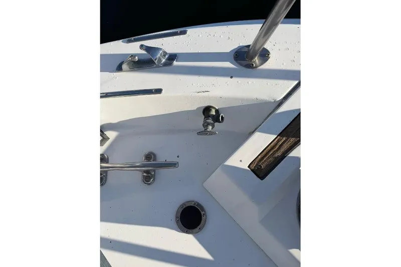 Slide: The Image of Deck details of a 1984 Gulfstar 49 Motor Yacht, featuring cleats and fittings. - 21