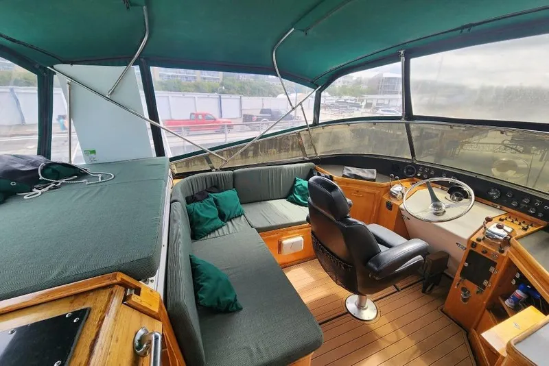 Slide: The Image of Interior of a 1984 Gulfstar 49 Motor Yacht with helm station. - 30