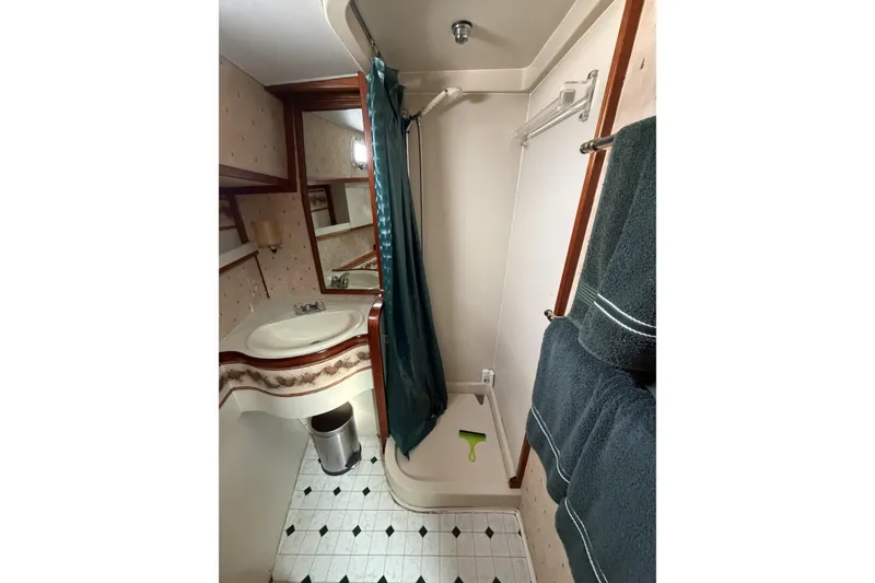Slide: The Image of Bathroom interior of 1984 Gulfstar 49 Motor Yacht with shower and sink. - 51