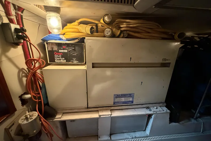 Slide: The Image of Engine room of 1984 Gulfstar 49 Motor Yacht with Onan Marine GenSet. - 75