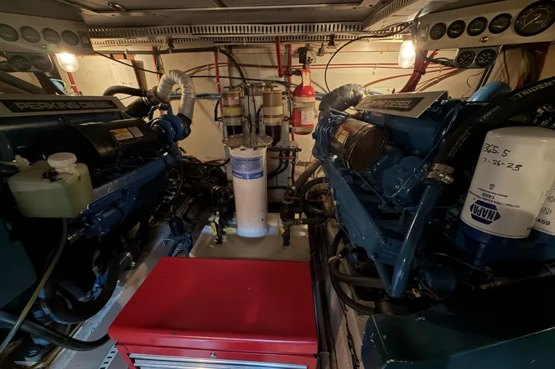 Slide: The Image of Engine room of 1984 Gulfstar 49 Motor Yacht with Perkins diesel engines. - 76