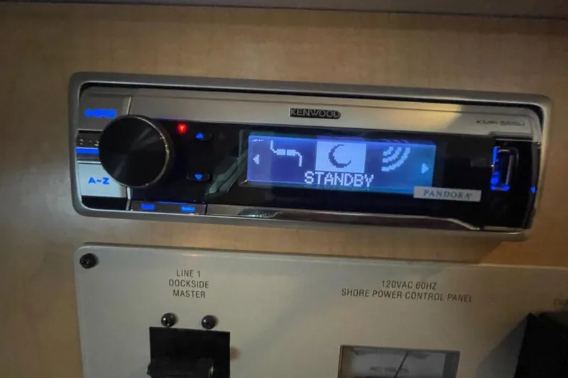 Slide: The Image of Kenwood stereo system on 2000 Bayliner 2655 Ciera Sunbridge, displaying standby mode. - 3