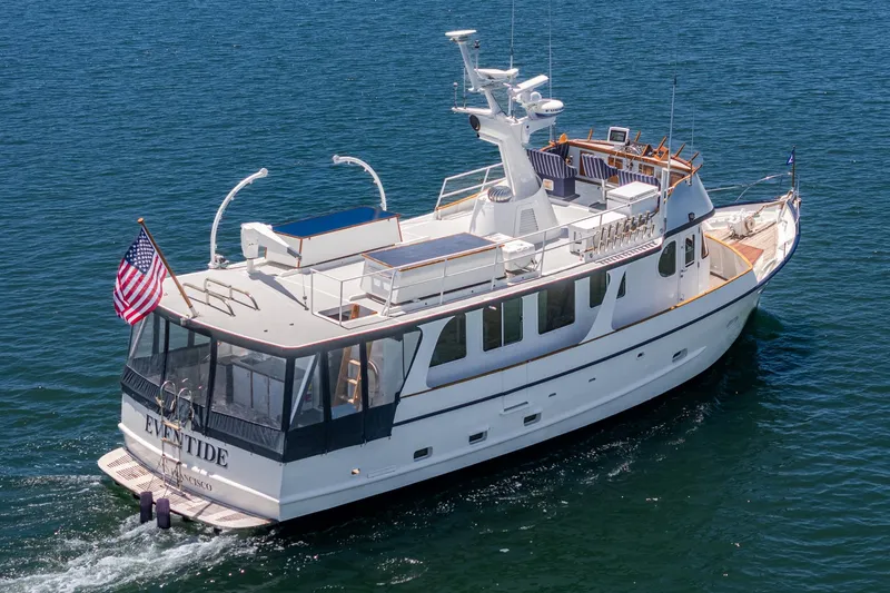 Slide: The Image of 1963 DeFever Custom Skallerud & Sons yacht cruising on open water. - 3