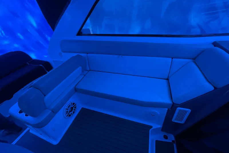 Slide: The Image of Interior of 2012 Regal 35 Sport Coupe with blue ambient lighting. - 23