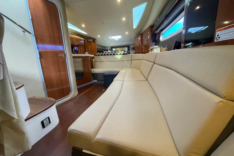 Slide: The Image of Bathroom interior of 2012 Regal 35 Sport Coupe yacht, featuring sink and toilet. - 39