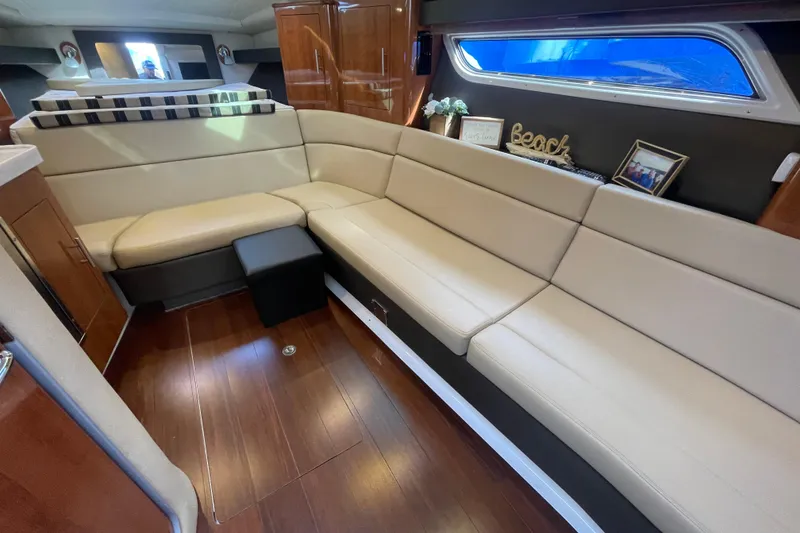 Slide: The Image of Bathroom vanity in 2012 Regal 35 Sport Coupe yacht, featuring sink and toiletries. - 40