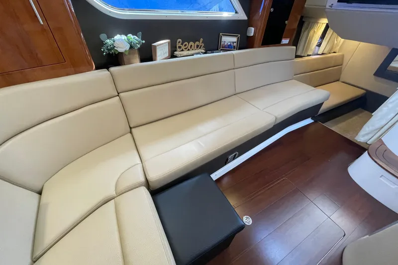 Slide: The Image of 2012 Regal 35 Sport Coupe bathroom with toilet and sleek countertop design. - 41