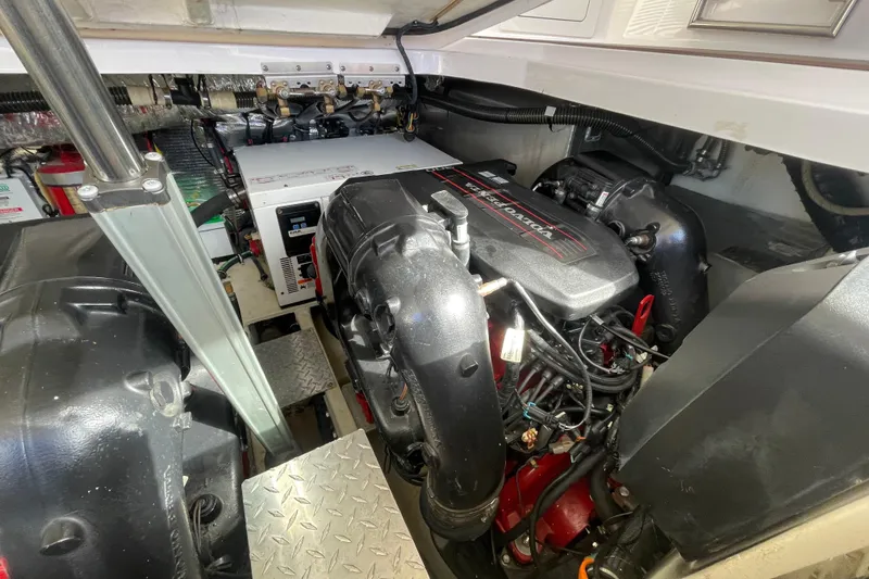 Slide: The Image of Engine compartment of a 2012 Regal 35 Sport Coupe, showcasing mechanical components. - 51
