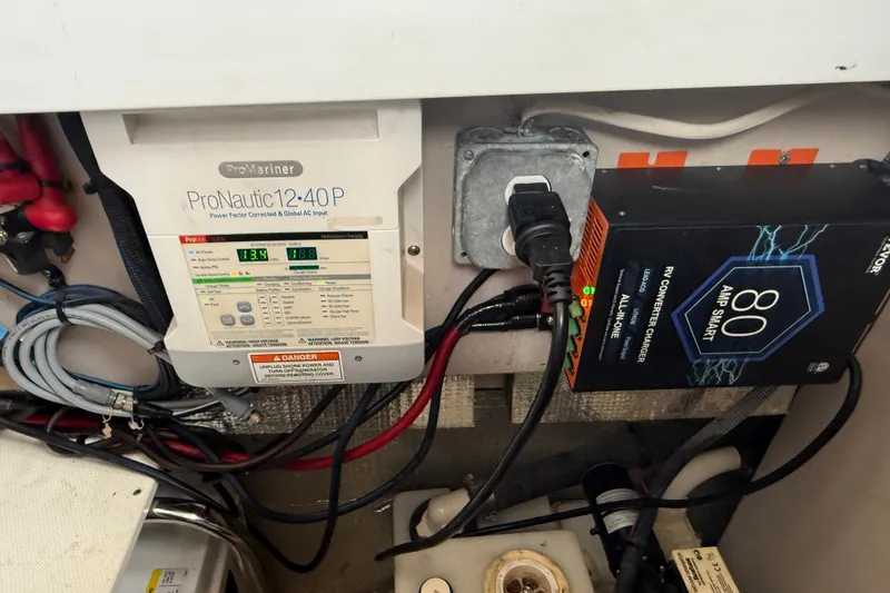 Slide: The Image of Electrical system of a 2014 Sea Ray 370 Venture with ProNautic charger and converter. - 30