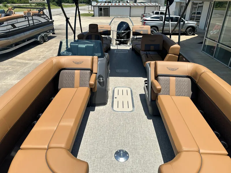 Slide: The Image of The image shows the interior of a 2026 Bennington 24 MSL with luxurious leather seating. - 3
