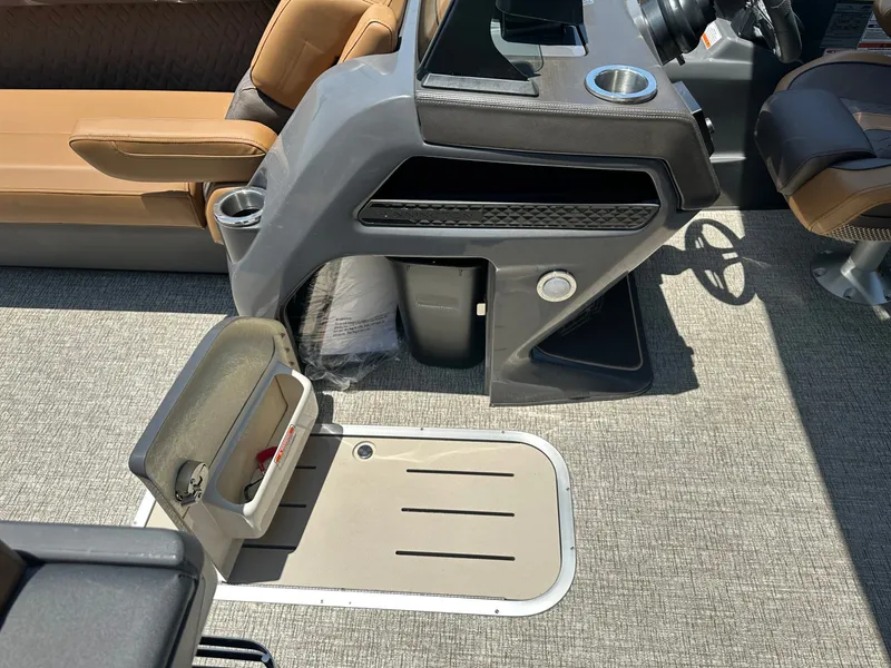 Slide: The Image of The image shows the cockpit of a 2026 Bennington 24 MSL with modern seating and a sleek helm. - 8