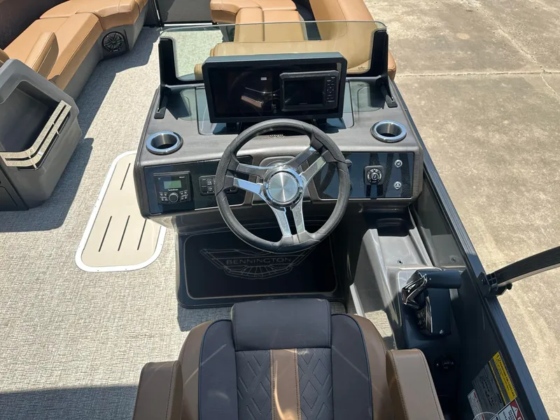 Slide: The Image of The image shows the cockpit of a 2026 Bennington 24 MSL with a modern helm station. - 17
