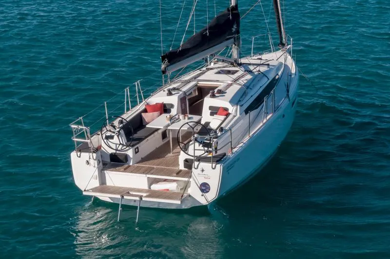 Slide: The Image of Manufacturer Provided Image: 2026 Jeanneau Sun Odyssey 380 sailboat on clear blue water. - 4