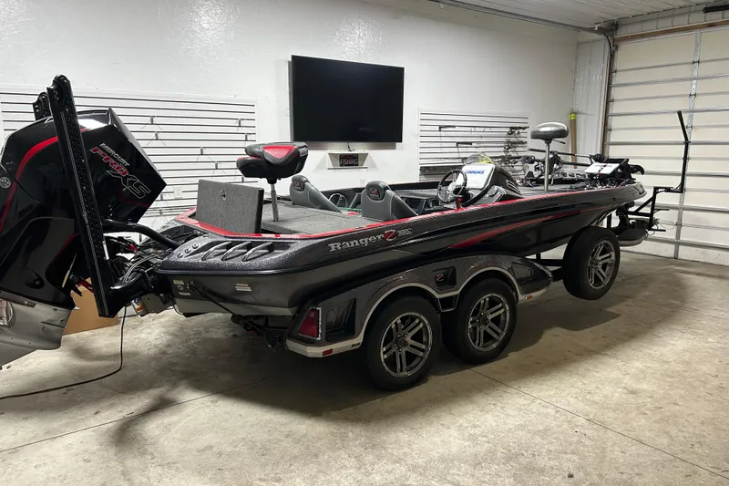 The Image of 2020 Ranger Z520C Cup-Equipped boat in garage, featuring sleek design and powerful engine. - 1