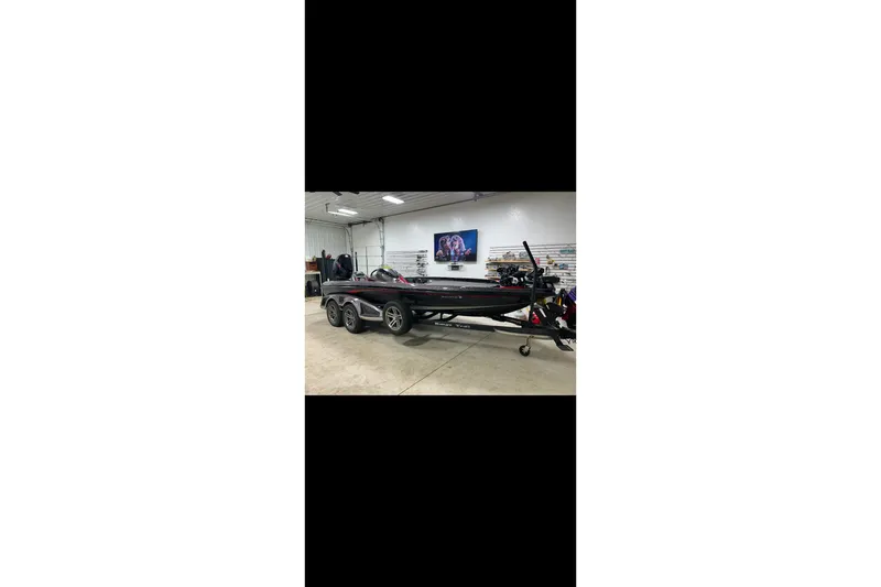 Slide: The Image of 2020 Ranger Z520C Cup-Equipped boat in a garage setting. - 3