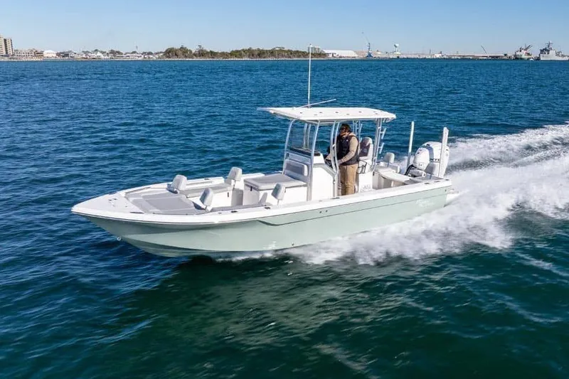 Slide: The Image of Manufacturer Provided Image: 2025 Bay Rider 269 Bay boat cruising on open water, showcasing sleek design and performance. - 2