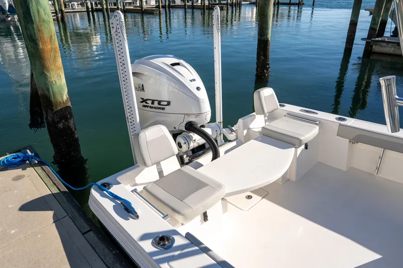 Slide: The Image of 2026 Bay Rider 269 Bay boat with Yamaha XTO Offshore engine docked at marina. - 27
