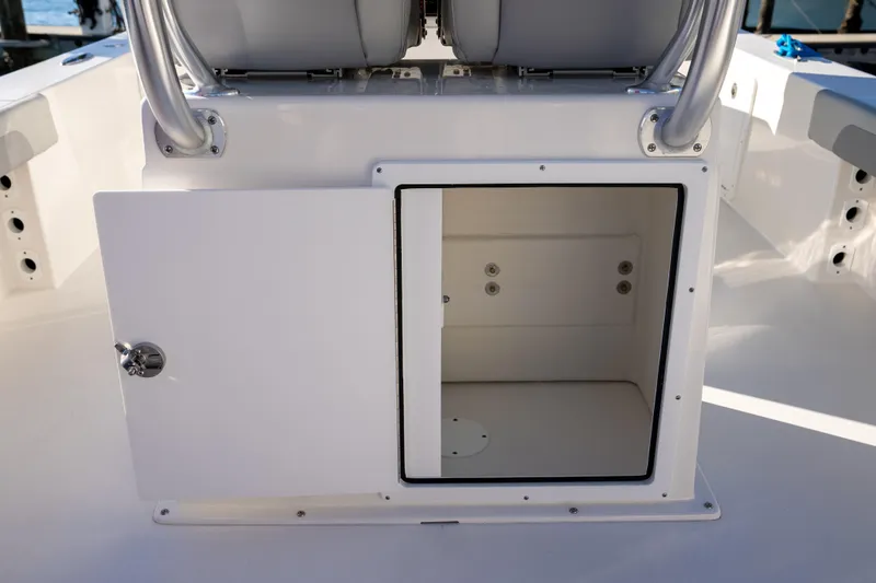 Slide: The Image of Open storage compartment on 2026 Bay Rider 269 Bay boat, showcasing interior space. - 39
