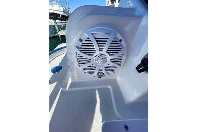 Slide: The Image of 2026 Bay Rider 269 Bay boat speaker detail with sleek white design. - 54
